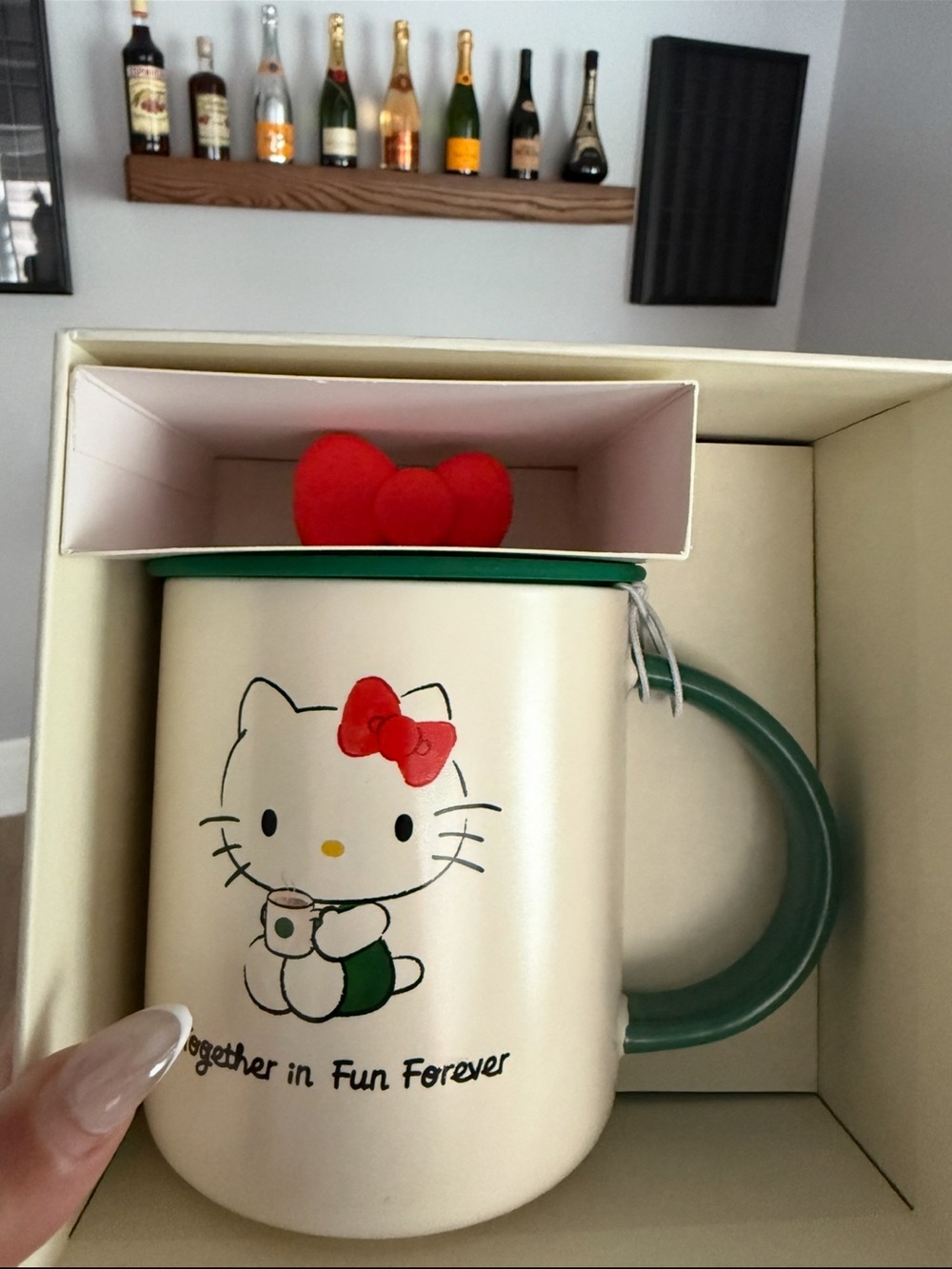 Hello Kitty STARBUCKS Cream Mug with Red Bow and Green Handle